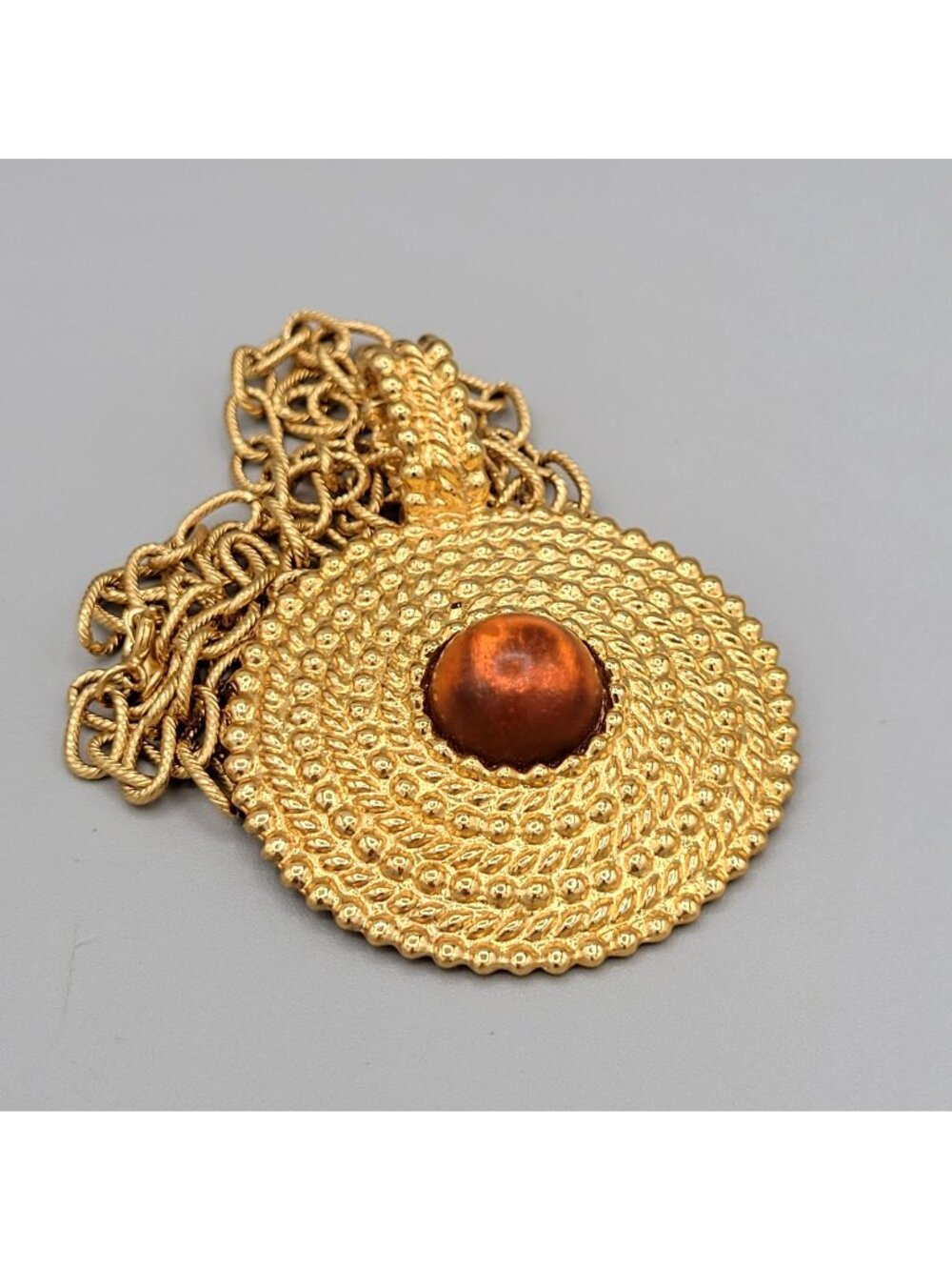 Vintage Avon Large Gold Tone Medallion Necklace With Brown Lucite Bead Center